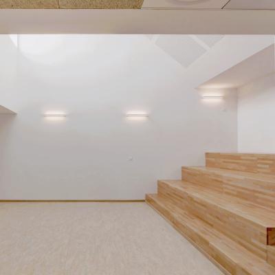 eclairage LED dans plafond bois Laudescher groupe scolaire